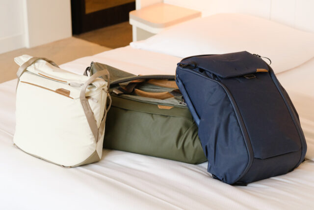 Peak Design Everyday bags on freshly made hotel bed